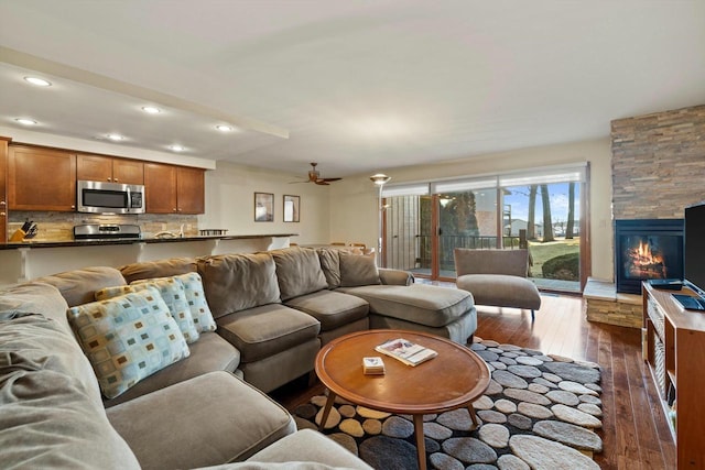 1070 S Lake Shore Dr Unit 8-1-A, Lake Geneva, WI 53147 - living area with dark wood-type flooring, recessed lighting, ceiling fan, and a fireplace