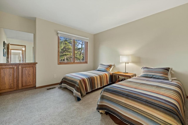 1070 S Lake Shore Dr Unit 8-1-A, Lake Geneva, WI 53147 - bedroom with baseboards and light colored carpet