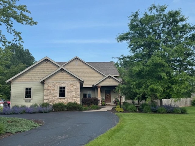 4920 N Meade St, Appleton, WI 54913 - craftsman-style house with stone siding and driveway