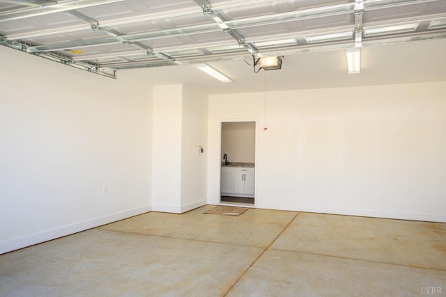 119 Lockridge Ln, Lynchburg, VA 24502 - garage with baseboards and a sink