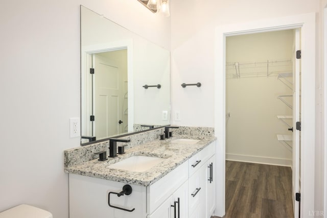 119 Lockridge Ln, Lynchburg, VA 24502 - full bathroom with double vanity, wood finished floors, a spacious closet, and toilet