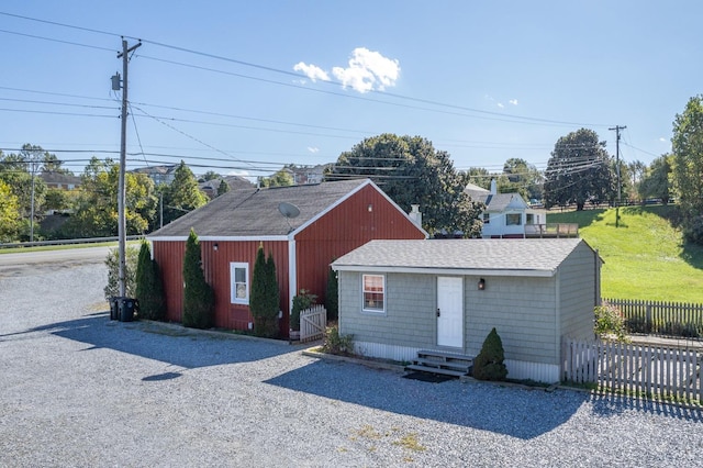 7505 Timberlake Rd, Lynchburg, VA 24502 - view of front of house featuring entry steps, fence, and an outbuilding