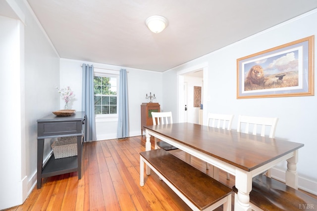 7505 Timberlake Rd, Lynchburg, VA 24502 - dining area featuring light wood finished floors, ornamental molding, and baseboards
