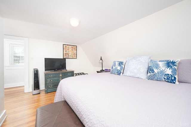 7505 Timberlake Rd, Lynchburg, VA 24502 - bedroom featuring light wood-style flooring, baseboards, and vaulted ceiling