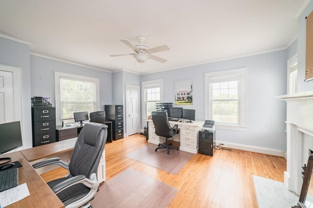 7821 Bellevue Rd, Forest, VA 24551 - home office with a ceiling fan, healthy amount of natural light, crown molding, light wood-style flooring, and a fireplace