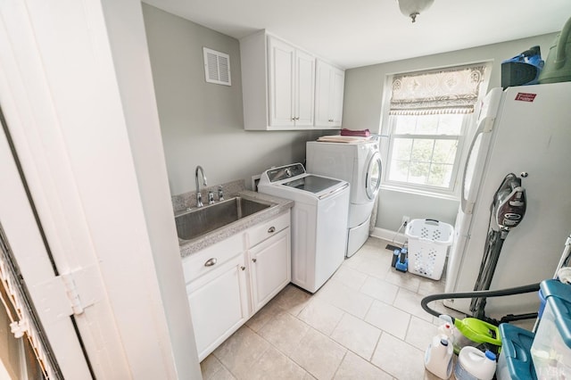 7821 Bellevue Rd, Forest, VA 24551 - clothes washing area with washer and dryer, light tile patterned floors, cabinets, and sink