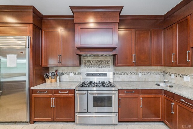 7821 Bellevue Rd, Forest, VA 24551 - kitchen with appliances with stainless steel finishes, a sink, backsplash, light stone counters, and light tile patterned floors