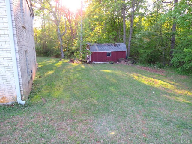 11420 Wards Rd, Rustburg, VA 24588 - view of grassy yard featuring a wooded view