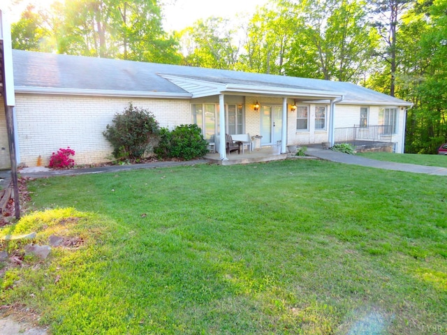 11420 Wards Rd, Rustburg, VA 24588 - single story home with a front yard, brick siding, and covered porch