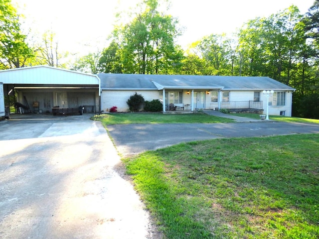 11420 Wards Rd, Rustburg, VA 24588 - ranch-style house with asphalt driveway, a front yard, and a carport