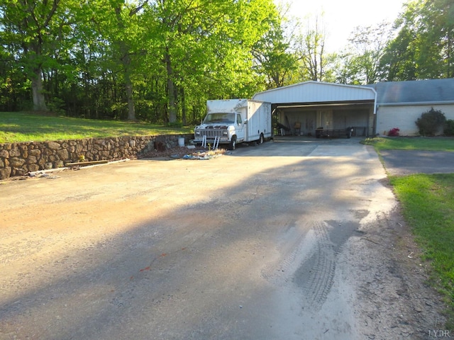 11420 Wards Rd, Rustburg, VA 24588 - garage featuring asphalt driveway