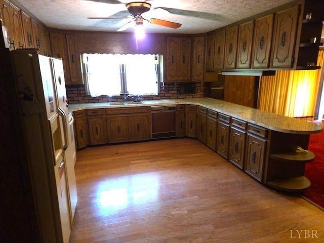 11420 Wards Rd, Rustburg, VA 24588 - kitchen with dishwasher, open shelves, white refrigerator with ice dispenser, a sink, and light wood-style floors