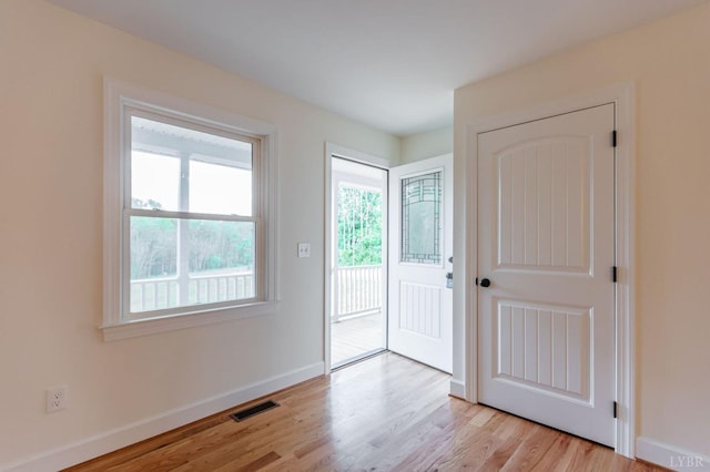465 Soybean Dr, Appomattox, VA 24522 - foyer with light wood-style flooring and baseboards