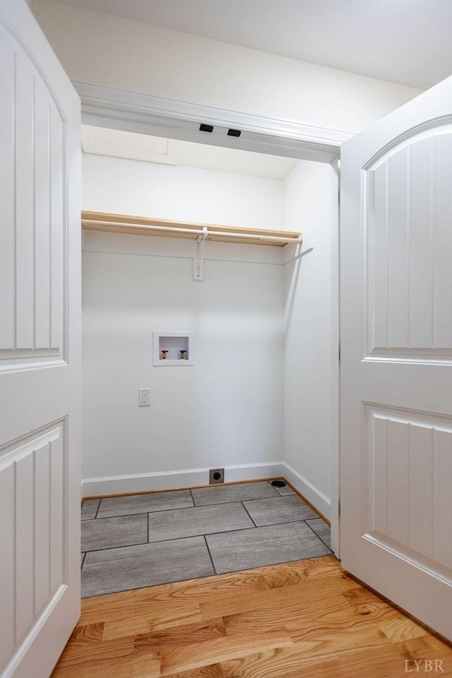 465 Soybean Dr, Appomattox, VA 24522 - laundry room featuring washer hookup, light wood-style floors, electric dryer hookup, and baseboards