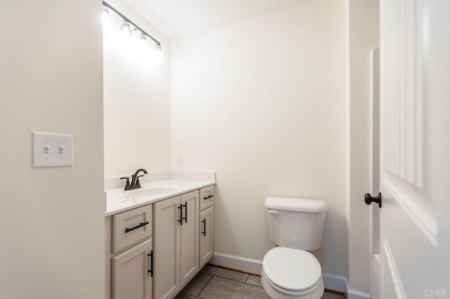 465 Soybean Dr, Appomattox, VA 24522 - half bathroom featuring vanity, toilet, and baseboards