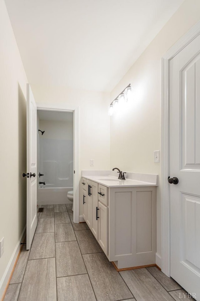 465 Soybean Dr, Appomattox, VA 24522 - full bath with vanity, toilet, bathtub / shower combination, and wood finished floors