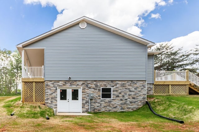 465 Soybean Dr, Appomattox, VA 24522 - rear view of property featuring a wooden deck, a yard, and stone siding