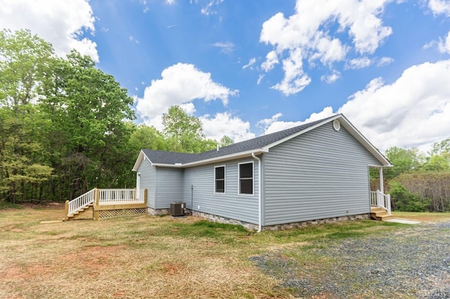 465 Soybean Dr, Appomattox, VA 24522 - view of side of home with a wooden deck and a yard