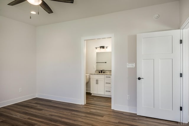 104 Lockridge Ln, Lynchburg, VA 24502 - unfurnished bedroom with dark wood-type flooring, a sink, baseboards, and ensuite bath