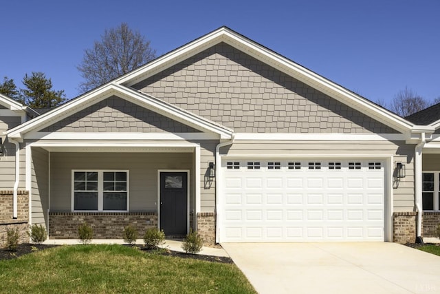 104 Lockridge Ln, Lynchburg, VA 24502 - craftsman inspired home with brick siding, concrete driveway, and an attached garage