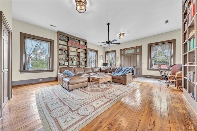 2816 Lowesville Rd, Lowesville, VA 22922 - living room featuring light wood finished floors, ceiling fan, and baseboards