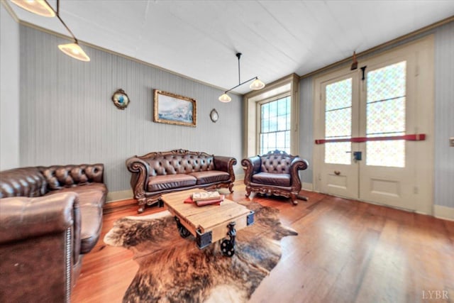 2816 Lowesville Rd, Lowesville, VA 22922 - living room featuring wood finished floors, french doors, crown molding, and baseboards