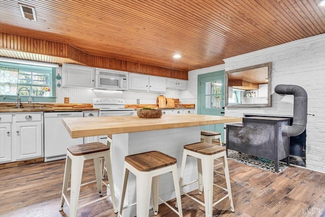 2816 Lowesville Rd, Lowesville, VA 22922 - kitchen with wooden counters, white appliances, a sink, wood ceiling, and white cabinets