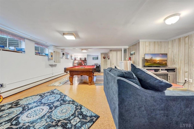 living room with pool table, ornamental molding, and baseboard heating
