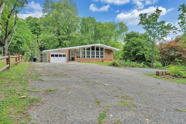 view of front of home with a garage