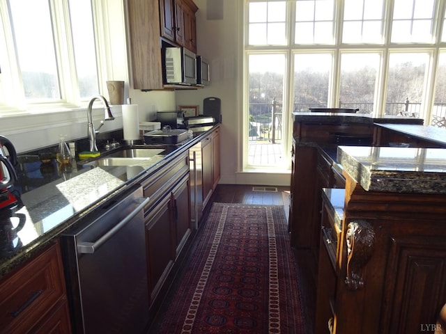 1402 Stapleton Rd, Gladstone, VA 24553 - kitchen featuring appliances with stainless steel finishes, dark stone countertops, and sink