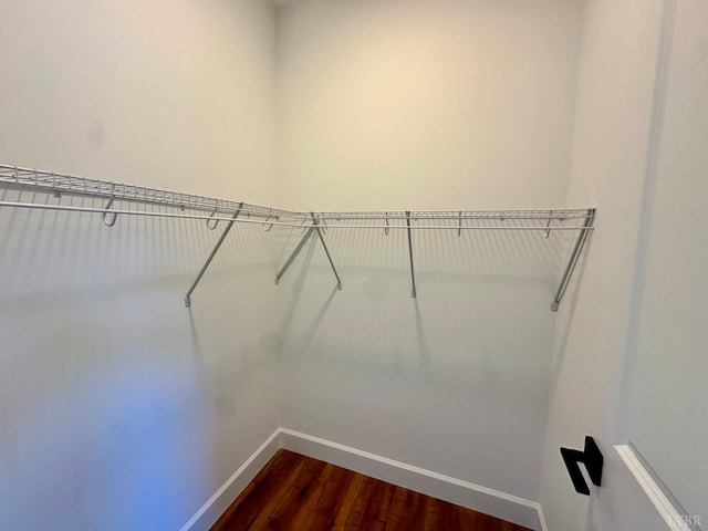 4678 Wildway Rd, Appomattox, VA 24522 - walk in closet with dark wood-style floors