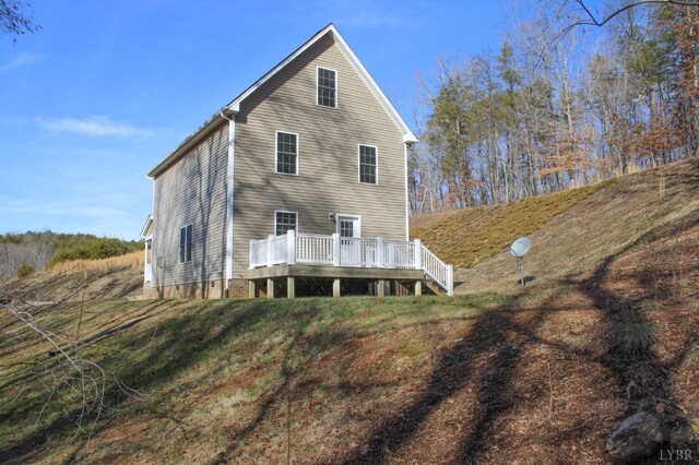 872 Two Bid Rd, Evington, VA 24550 - back of property featuring a wooden deck