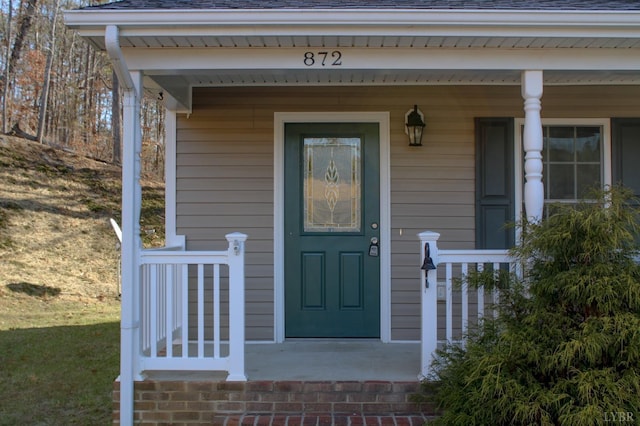872 Two Bid Rd, Evington, VA 24550 - doorway to property featuring a porch and roof with shingles