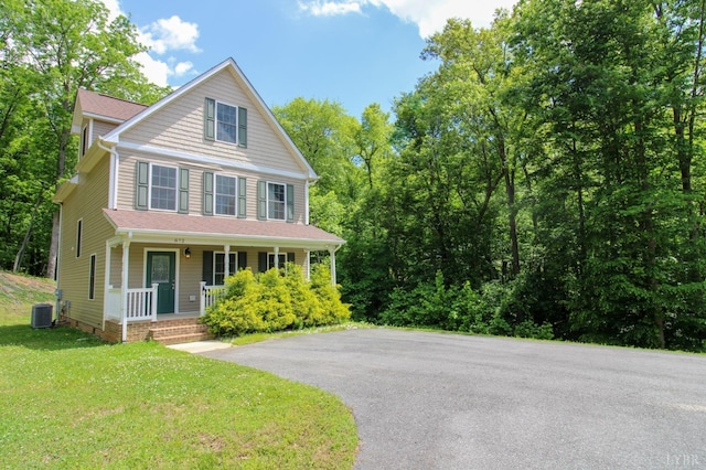 872 Two Bid Rd, Evington, VA 24550 - view of front of property with central AC unit, driveway, a front yard, and covered porch