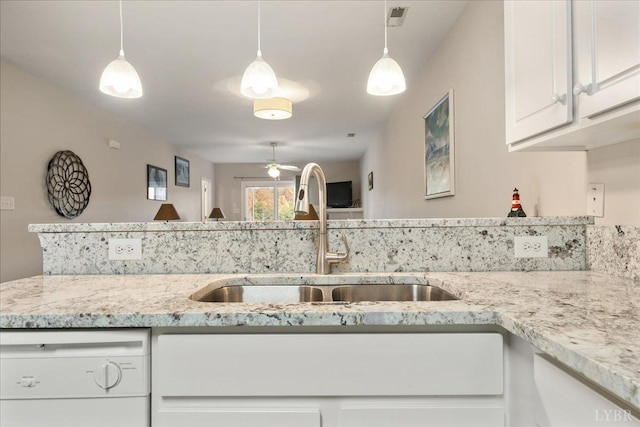 1055 Mariners Way, Huddleston, VA 24104 - kitchen featuring a sink, white dishwasher, white cabinetry, a ceiling fan, and light stone counters