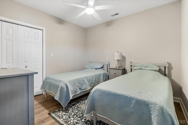1055 Mariners Way, Huddleston, VA 24104 - bedroom featuring wood finished floors, a closet, and a ceiling fan