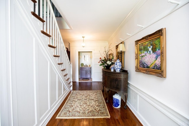 1501 Saxkey, Drakes Branch, VA 23937 - entrance foyer featuring stairs, wood finished floors, crown molding, and a wainscoted wall