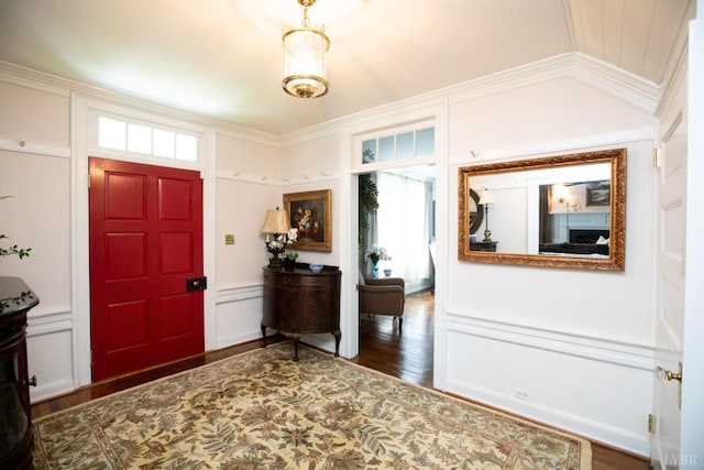 1501 Saxkey, Drakes Branch, VA 23937 - entrance foyer featuring a decorative wall, wood finished floors, and crown molding