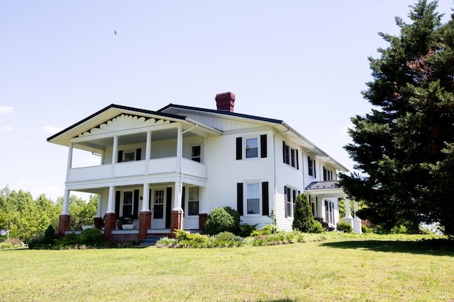 1501 Saxkey, Drakes Branch, VA 23937 - greek revival inspired property with a balcony, covered porch, a chimney, and a front yard