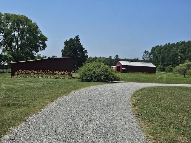 1501 Saxkey, Drakes Branch, VA 23937 - surrounding community with a lawn, an outbuilding, and driveway
