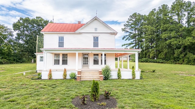 3629 Smith Mountain Lake Pkwy, Huddleston, VA 24104 - farmhouse with a porch and a front yard