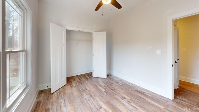 87 Greenhouse Rd, Rustburg, VA 24588 - unfurnished bedroom with a closet, baseboards, and light wood-type flooring