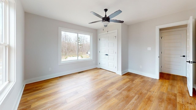 193 Allure Dr, Rustburg, VA 24588 - unfurnished bedroom with a closet, light wood-type flooring, visible vents, and baseboards