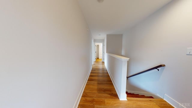193 Allure Dr, Rustburg, VA 24588 - corridor with baseboards, wood finished floors, and an upstairs landing