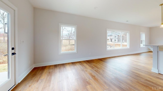 193 Allure Dr, Rustburg, VA 24588 - unfurnished living room featuring light wood-style floors and baseboards