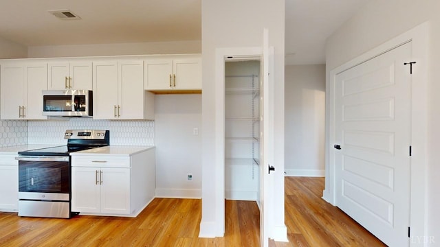 193 Allure Dr, Rustburg, VA 24588 - kitchen featuring white cabinetry, appliances with stainless steel finishes, and light countertops