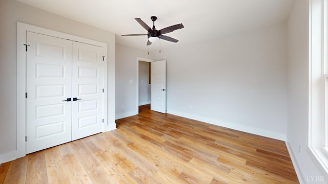 193 Allure Dr, Rustburg, VA 24588 - unfurnished bedroom featuring a ceiling fan, a closet, light wood-style flooring, and baseboards