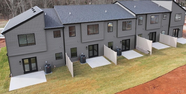 193 Allure Dr, Rustburg, VA 24588 - back of property featuring central AC, a lawn, and a patio area