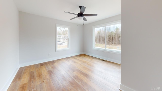 193 Allure Dr, Rustburg, VA 24588 - empty room featuring light wood finished floors, plenty of natural light, visible vents, and baseboards