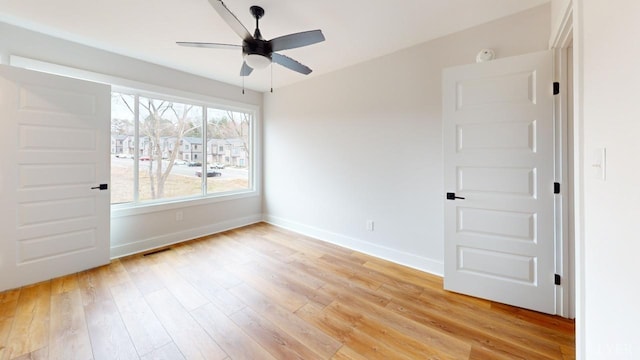 193 Allure Dr, Rustburg, VA 24588 - spare room featuring light wood-type flooring, baseboards, visible vents, and a ceiling fan